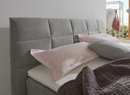 Polohovacia kontinentálna posteľ EMALIA